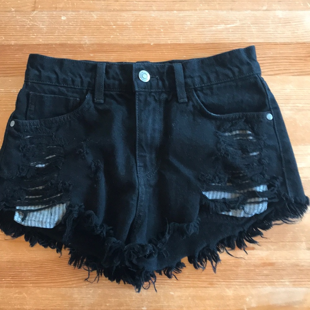 Pistols Black Mid-rise Distressed Jean shorts.